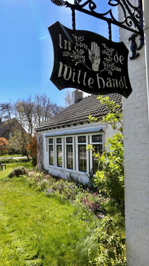 De witte handt Midsland Buitenkant foto